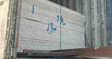 丹东 芝麻白花岗岩石材3.0公分光面毛板装柜出货