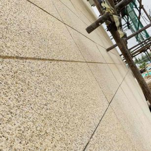 丹东 黄金麻花岗岩荔枝面外墙干挂石材效果示例