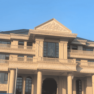 丹东黄金麻别墅外墙干挂石材效果示例